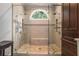Double shower with two shower heads and a built-in seat at 1170 Lowell Rd, Carrollton, GA 30116