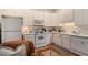 Well-equipped kitchen with white cabinets and modern appliances at 1170 Lowell Rd, Carrollton, GA 30116