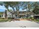 Ranch style home with large porch and mature trees at 1170 Lowell Rd, Carrollton, GA 30116
