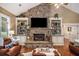 Gathering room with a stone fireplace and built-in shelving at 1170 Lowell Rd, Carrollton, GA 30116