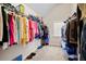 Large walk-in closet with ample hanging space at 4550 Fernbrook Pl, Cumming, GA 30040