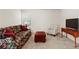 Comfortable sitting area with sofa, chair, and ottoman at 4550 Fernbrook Pl, Cumming, GA 30040