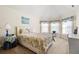 Bedroom with bay window and floral bedding at 4550 Fernbrook Pl, Cumming, GA 30040