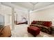 Spacious main bedroom with sitting area and large windows at 4550 Fernbrook Pl, Cumming, GA 30040