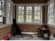 Spacious sunroom with ample natural light and hardwood floors at 490 Hill Se St, Atlanta, GA 30312