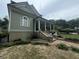 Charming two-story home with wrap-around porch and landscaping at 490 Hill Se St, Atlanta, GA 30312