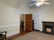 Living room with hardwood floors, fireplace, and access to other rooms at 490 Hill Se St, Atlanta, GA 30312