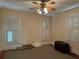 Bright bedroom with hardwood floors, plantation shutters, and ceiling fan at 490 Hill Se St, Atlanta, GA 30312