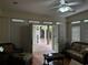 Bright sunroom with French doors opening onto a deck at 490 Hill Se St, Atlanta, GA 30312
