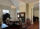 Elegant dining room featuring a large table, hardwood floors, and antique furniture at 490 Hill Se St, Atlanta, GA 30312