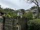 Rear view of home showing addition and lattice fence at 490 Hill Se St, Atlanta, GA 30312