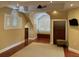 Large bedroom with hardwood floors, plantation shutters, and built-ins at 490 Hill Se St, Atlanta, GA 30312