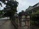 Home with stone wall and wrought iron fence at 490 Hill Se St, Atlanta, GA 30312