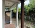 Private backyard patio with stone flooring and lush landscaping at 490 Hill Se St, Atlanta, GA 30312