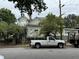 Residential street view with parked cars and green space at 490 Hill Se St, Atlanta, GA 30312