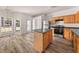 Eat-in kitchen with an island and vinyl flooring at 2736 Parkway Trl, Lithonia, GA 30058