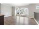 Spacious dining room with hardwood floors and large windows offering natural light at 1017 Brandsford Nw St, Atlanta, GA 30318