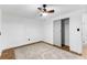 Spacious bedroom featuring wood floors and a barn door closet at 6940 Cainwood Dr, Atlanta, GA 30349