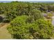 Property surrounded by lush green trees at 1152 Harbins Rd, Dacula, GA 30019