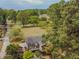 House with deck, surrounded by lush greenery at 1152 Harbins Rd, Dacula, GA 30019