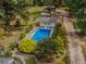 Aerial view showing a pool, shed, and expansive yard at 1152 Harbins Rd, Dacula, GA 30019