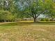 Charming ranch home nestled among mature trees at 1152 Harbins Rd, Dacula, GA 30019