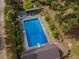 Aerial view of rectangular pool, deck, and shed at 1152 Harbins Rd, Dacula, GA 30019