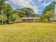Charming ranch home with large yard and mature trees at 1152 Harbins Rd, Dacula, GA 30019