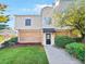 Two-story townhome with brick facade and manicured lawn at 3301 Henderson Mill Rd # Z1, Atlanta, GA 30341