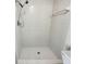 Clean shower stall with white tiled walls and a handheld showerhead at 3301 Henderson Mill Rd # Z1, Atlanta, GA 30341