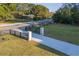 Aerial view of home showcasing expansive lawn and long driveway at 1645 Mayfield Rd, Alpharetta, GA 30009