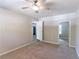 Bedroom with neutral wall color, carpet flooring, and access to other rooms at 1669 Freedom Vly, Decatur, GA 30032