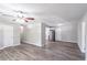 Open concept living room and kitchen with wood-look floors at 1669 Freedom Vly, Decatur, GA 30032