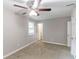 Bright bedroom with ceiling fan, carpet, and window at 1669 Freedom Vly, Decatur, GA 30032