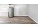 Kitchen with stainless steel appliances and adjacent dining area at 1669 Freedom Vly, Decatur, GA 30032