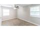 Bedroom with neutral walls, carpet flooring, and ceiling fan at 1669 Freedom Vly, Decatur, GA 30032