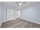 Bright bedroom with ceiling fan and double closet at 4959 Abbotts Glen Nw Trl, Acworth, GA 30101