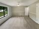 Spacious bedroom with new carpet and large window at 3551 Mill Glen Dr, Douglasville, GA 30135