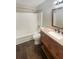 Updated bathroom with granite vanity and tile flooring at 3551 Mill Glen Dr, Douglasville, GA 30135