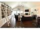 Spacious living room with built-in shelving and hardwood floors at 310 Ellington Dr, Canton, GA 30115