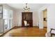 Bright dining room with hardwood floors and built-in hutch at 3474 Castleridge Dr, Tucker, GA 30084