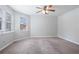 Spacious bedroom with neutral walls and carpeted floors at 3274 Forette Ln, Lithonia, GA 30038