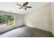 Bright bedroom with carpet flooring and a window offering natural light at 1437 Bramlett Hill Dr, Lawrenceville, GA 30045