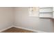 Cozy bedroom with hardwood floors and built-in shelving at 2072 Clairmont Ter, Atlanta, GA 30345
