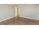 Well-lit bedroom featuring hardwood floors and an adjacent bathroom at 2072 Clairmont Ter, Atlanta, GA 30345
