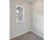 Bright walk-in closet with wire shelving and window at 1522 Dover Creek Ln, Lawrenceville, GA 30045