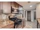 Modern kitchen with gas range and microwave at 3046 Briarcliff Ne Rd # 15, Atlanta, GA 30329