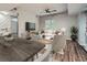 Open concept dining area with a rustic wooden table and modern chairs at 3046 Briarcliff Ne Rd # 15, Atlanta, GA 30329