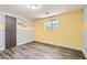 Bright bedroom with gray and yellow walls, and hardwood floors at 3046 Briarcliff Ne Rd # 15, Atlanta, GA 30329