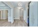 Bright entryway with hardwood floors, chandelier, and staircase at 110 Dunning Keep, Covington, GA 30016